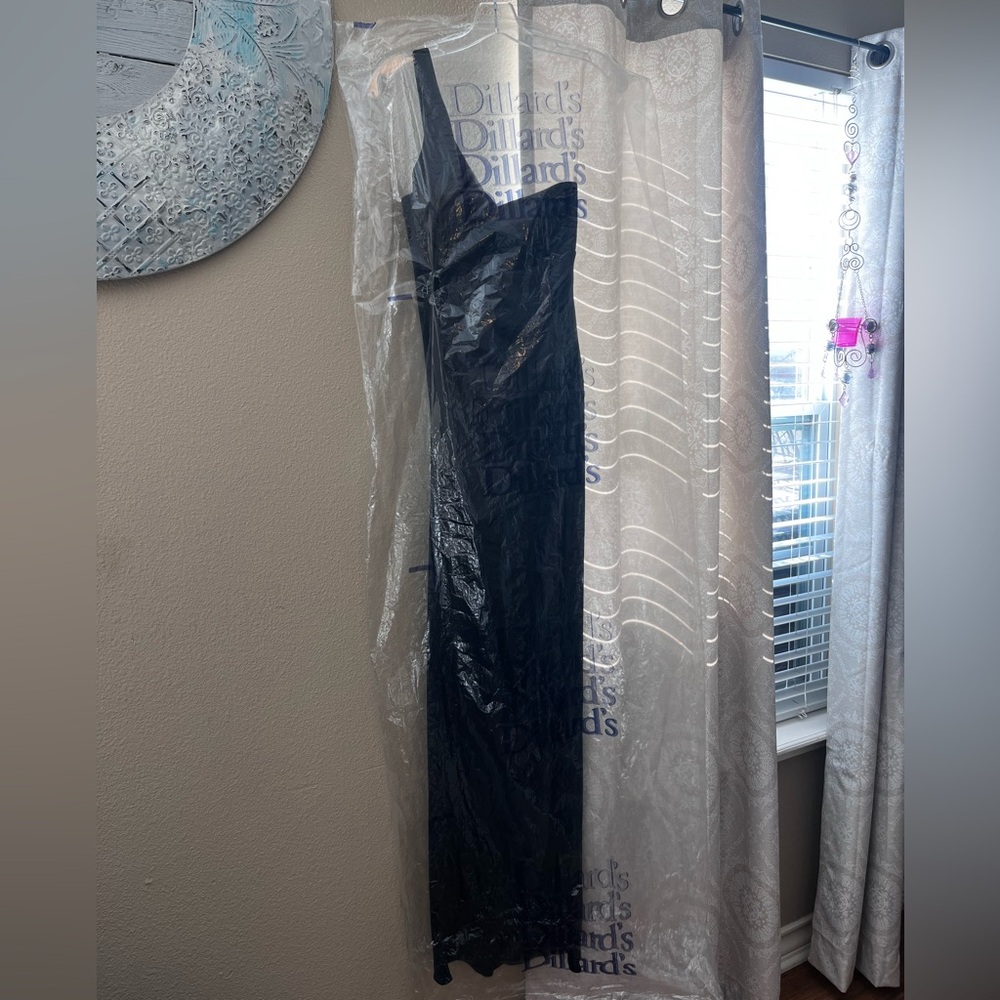 Dillards prom dress worn once, slight thread pulling on one side